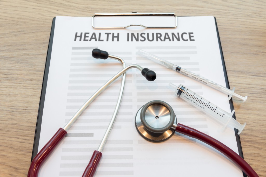 Health insurance with stethoscope