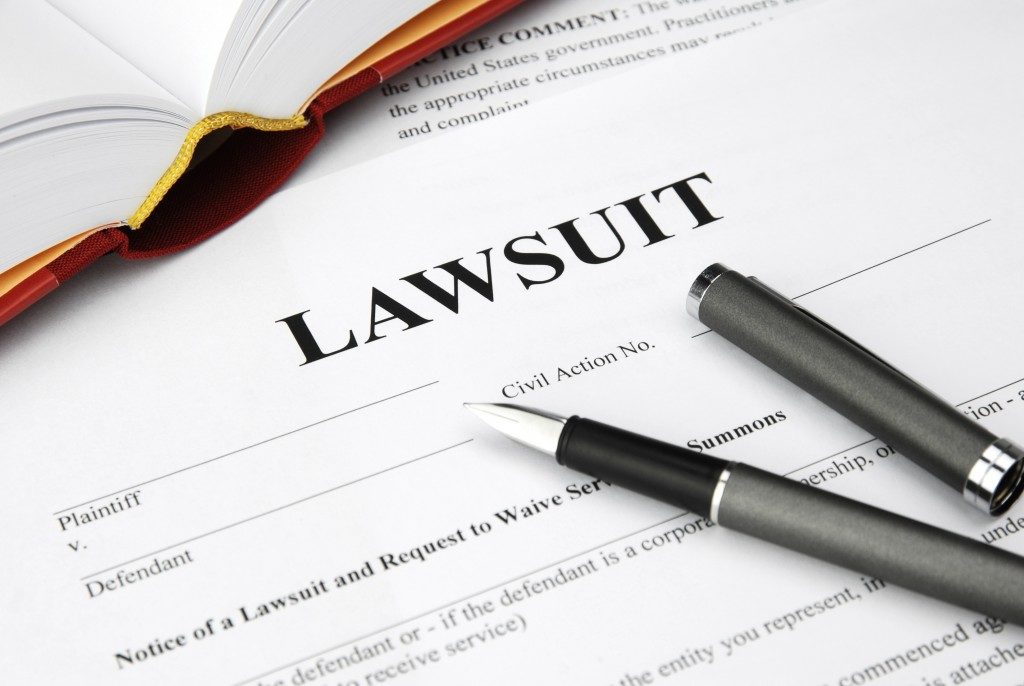 lawsuit form and pen