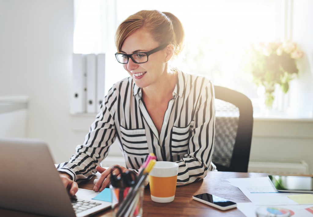 entrepreneur working on her laptop