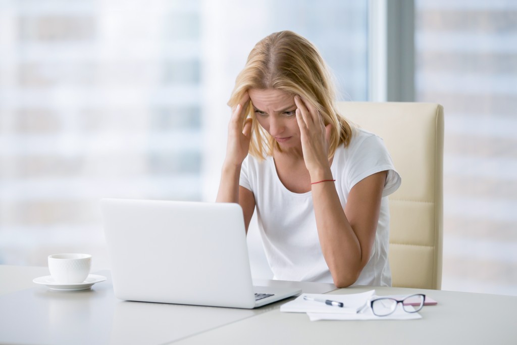 woman feeling stressed and tired