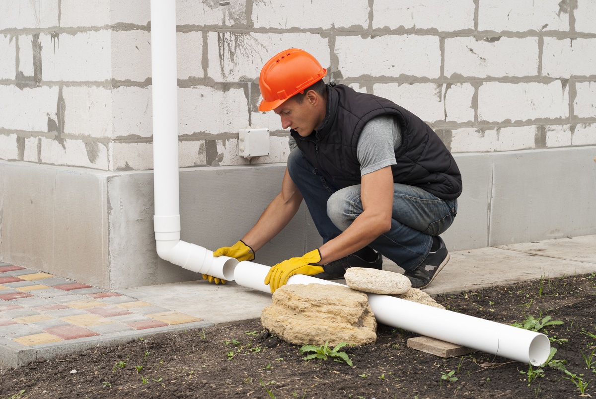 man adding tubes