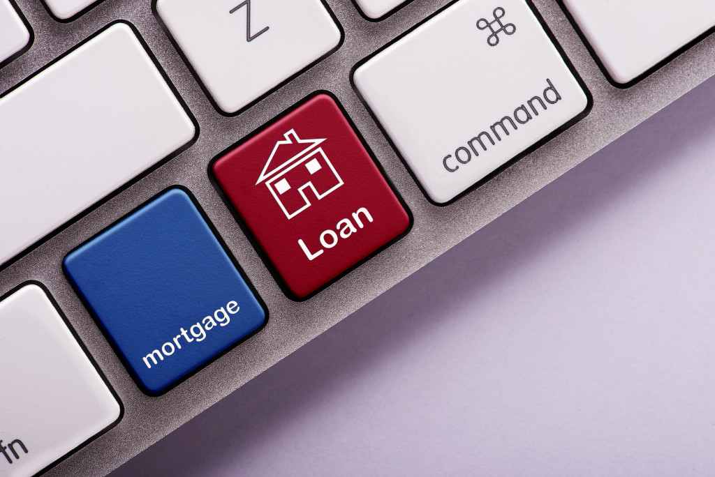 Mortgage loan button on white computer keyboard