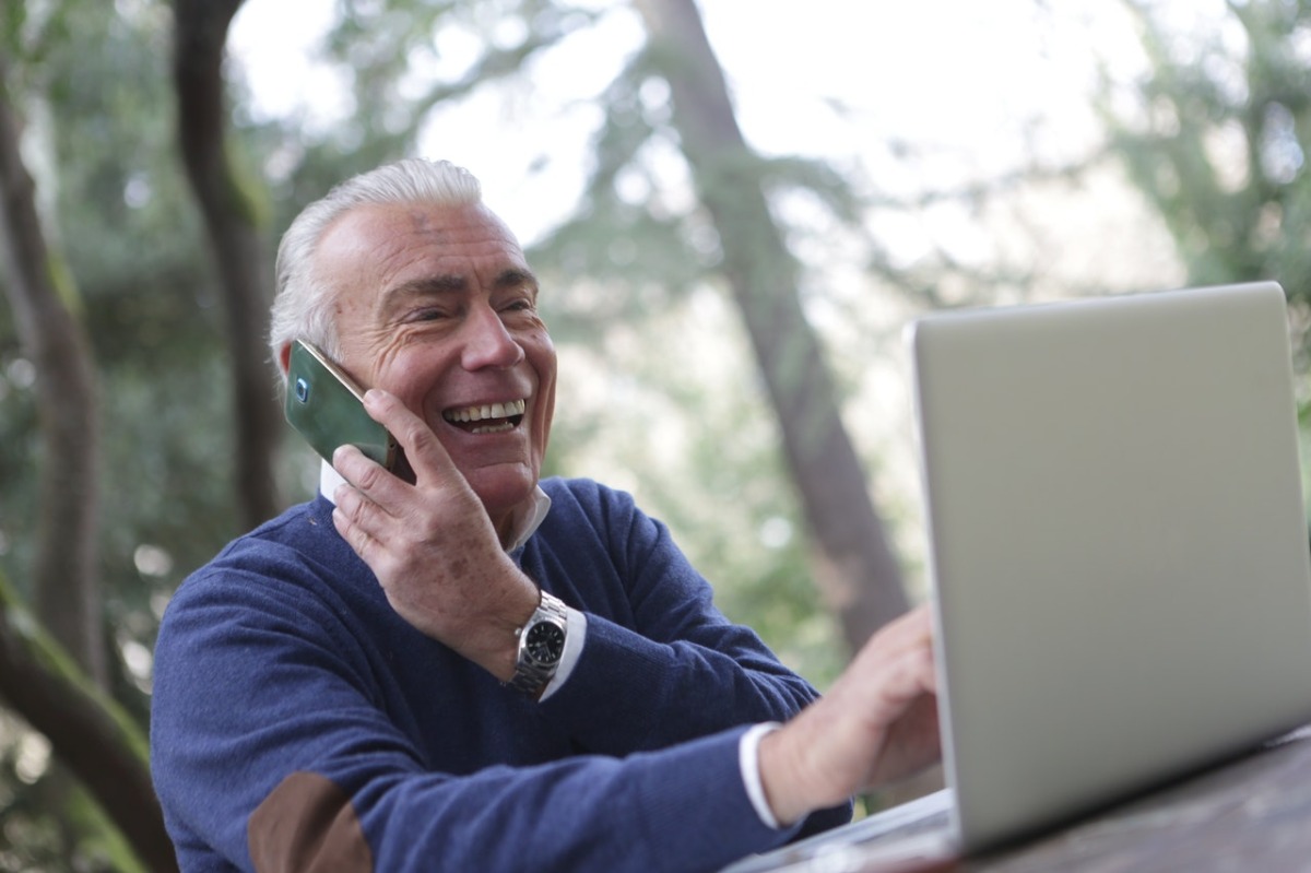 old man on his computer