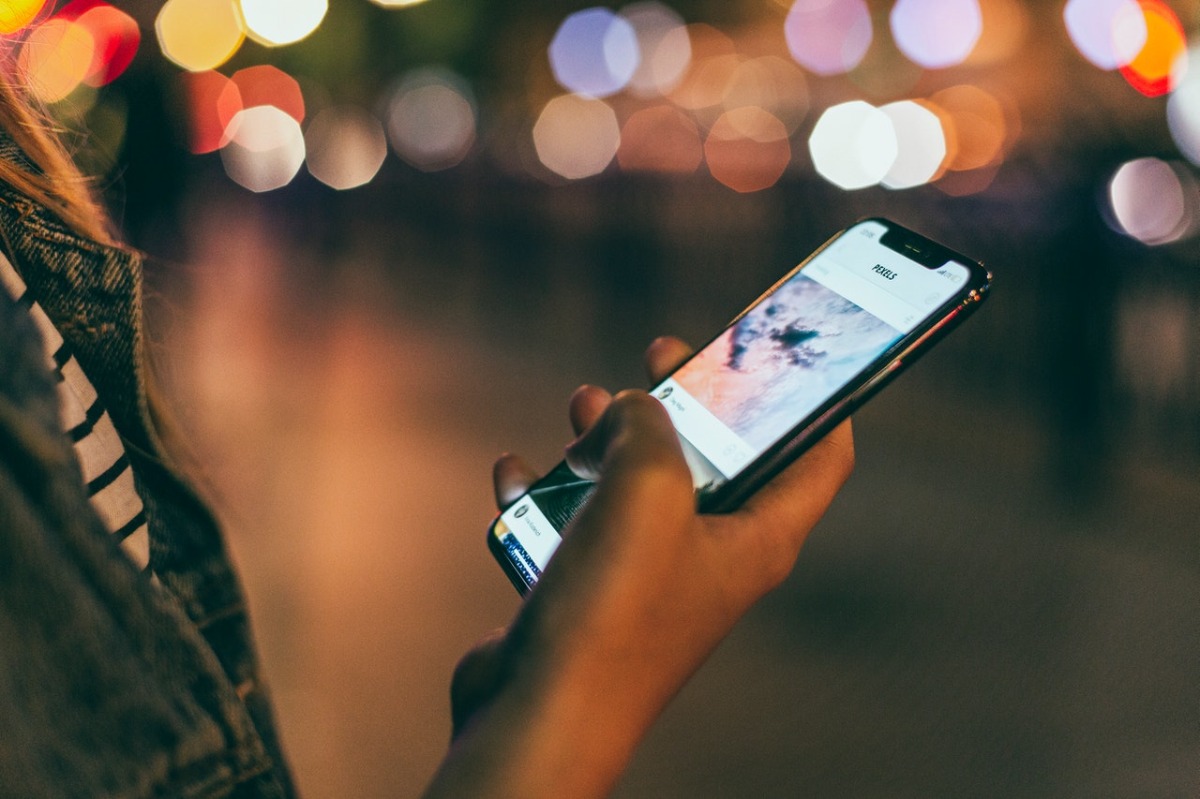 woman using her phone