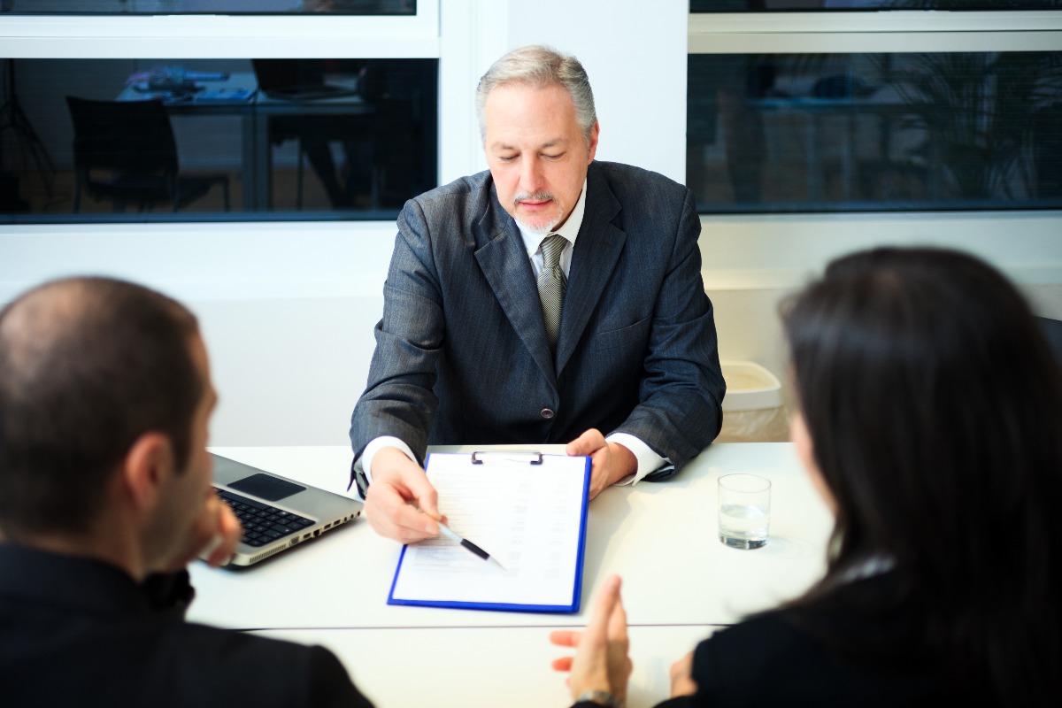 man holding a document